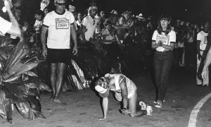 Julie Moss crawling during the 1982 Ironman, a moment of incredible perseverance.