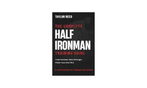 Book cover for "The Complete Half Ironman Training Guide" by Taylor Reed, featuring a cyclist silhouette and training advice.