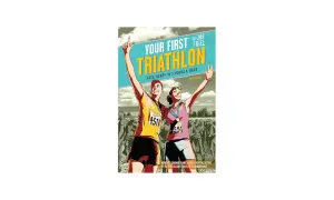 Book cover: "Your First Triathlon" by Joe Friel. A man and woman celebrate finishing a race, offering a guide on how to train for a triathlon.