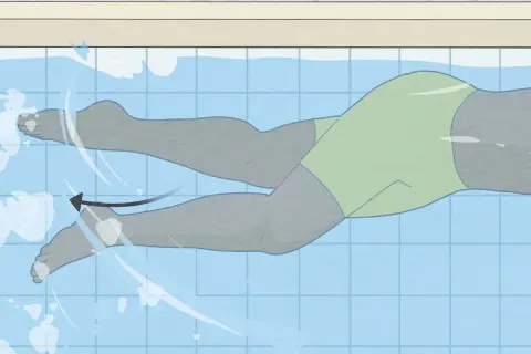 Illustration of a swimmer's legs demonstrating the freestyle kick technique. The legs are in a flutter motion, propelling the swimmer forward.