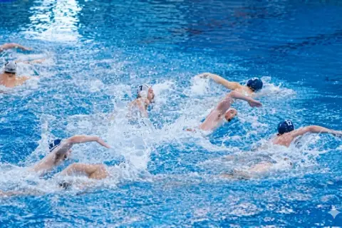 Intense water polo periods with athletes battling for the ball amidst splashing water.