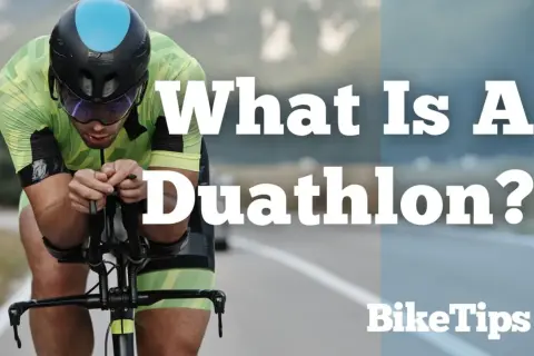 A cyclist in a neon green suit and helmet races on a road, with text asking "What Is A Duathlon?".