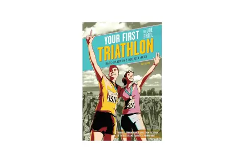 Book cover: "Your First Triathlon" by Joe Friel. A man and woman celebrate finishing a race, offering a guide on how to train for a triathlon.