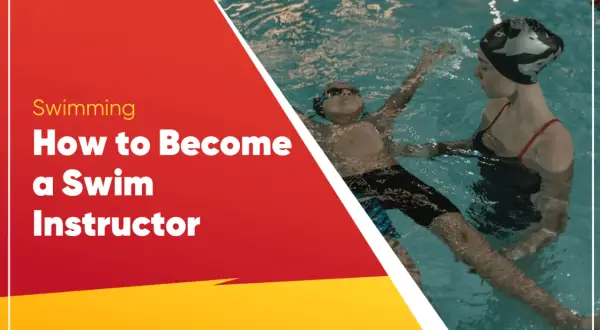 A swim instructor guides a young boy in the water. Learn how to become a swim instructor and share your passion for swimming.