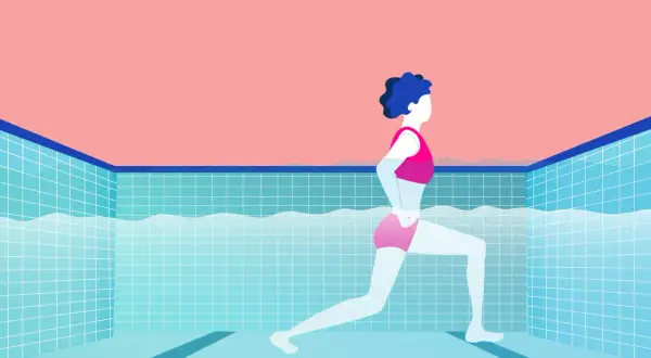 A person in pink swimwear performs a lunge in a tiled pool, showcasing effective swim fitness.