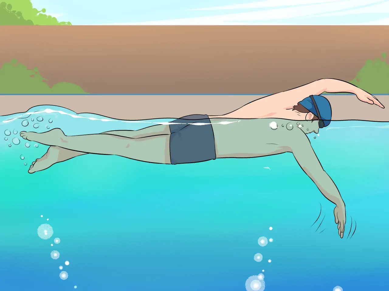 A person in swim cap and goggles practices freestyle swimming, a common stroke for beginner swim lessons for adults.
