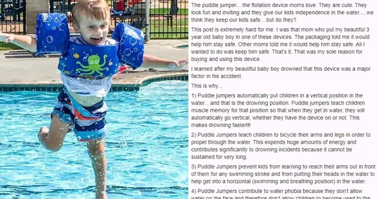 A happy boy in a blue puddle jumper with an octopus design splashes in a pool.