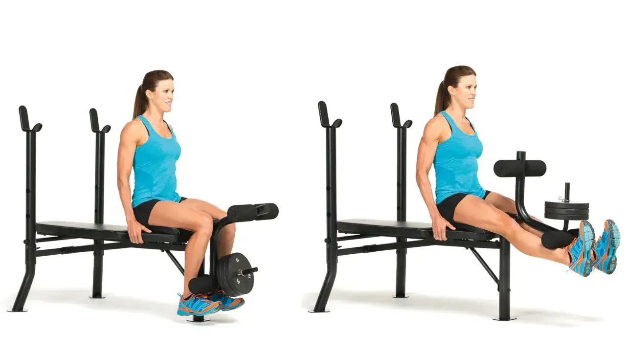 Woman performing leg extensions, a key exercise for leg workouts for swimmers, building powerful leg muscles for propulsion in the water.