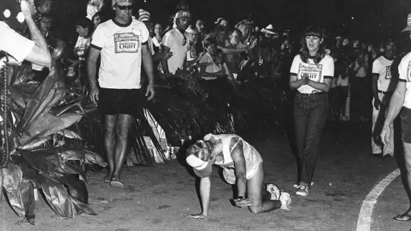 Julie Moss crawling during the 1982 Ironman, a moment of incredible perseverance.