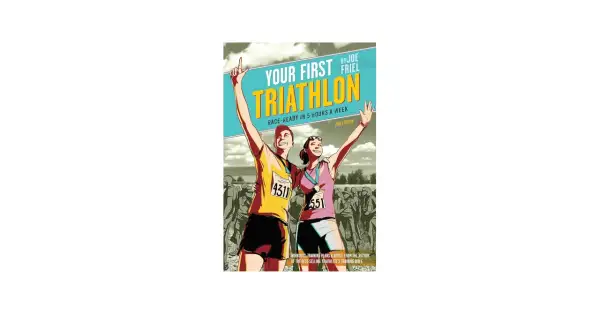 Book cover: "Your First Triathlon" by Joe Friel. A man and woman celebrate finishing a race, offering a guide on how to train for a triathlon.